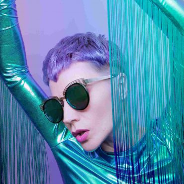 futuristic-girl-with-short-colored-hair-trendy-hai-BQ2FSZL