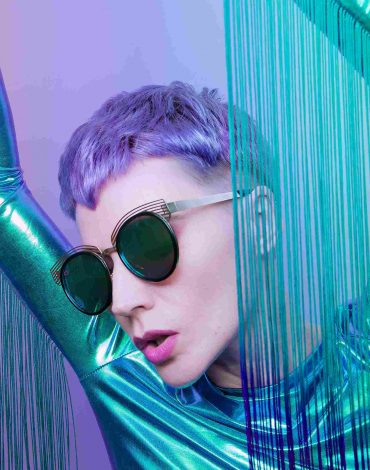 futuristic-girl-with-short-colored-hair-trendy-hai-BQ2FSZL